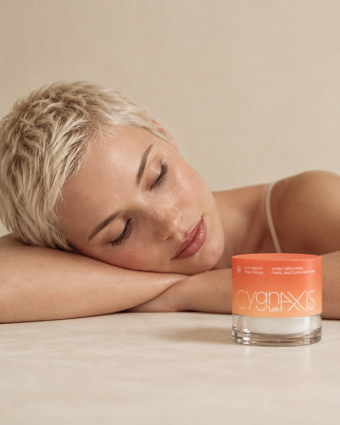 Woman resting beside a jar of face cream.